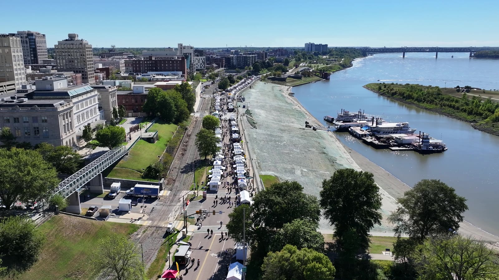 RiverArtsFest tents along Riverside Drive and the Mississippi, filmed from above by BabaluShow